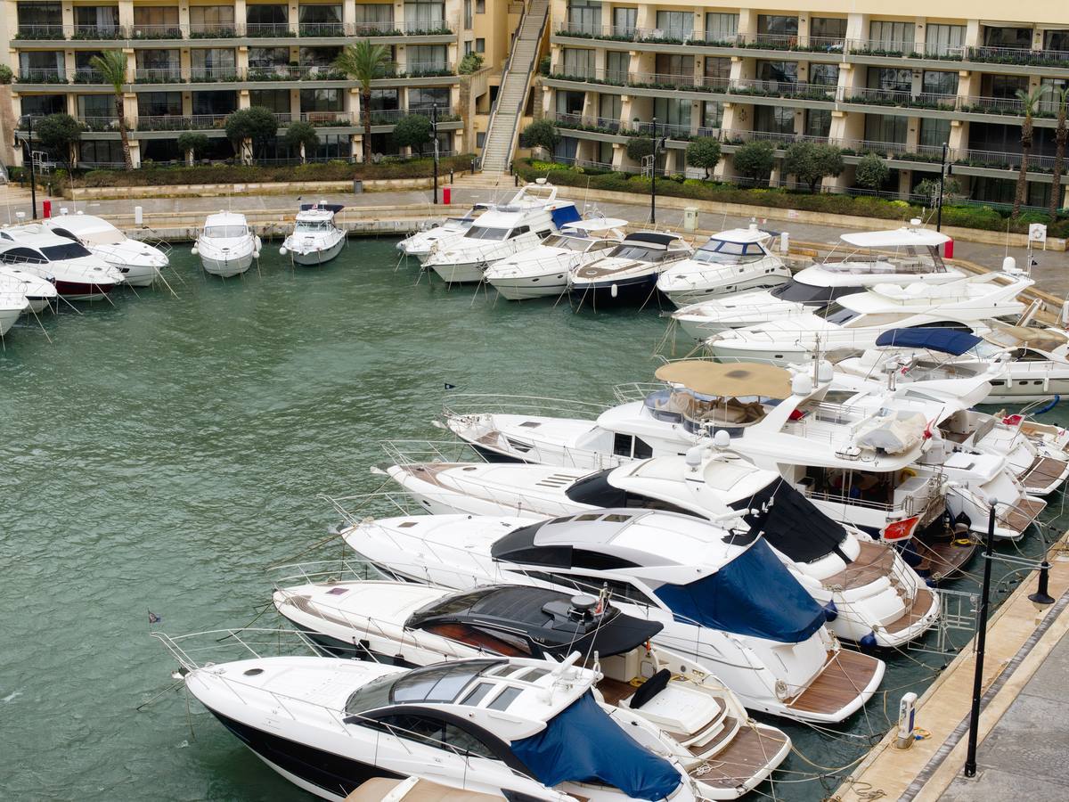 Yachts berthed at a marina