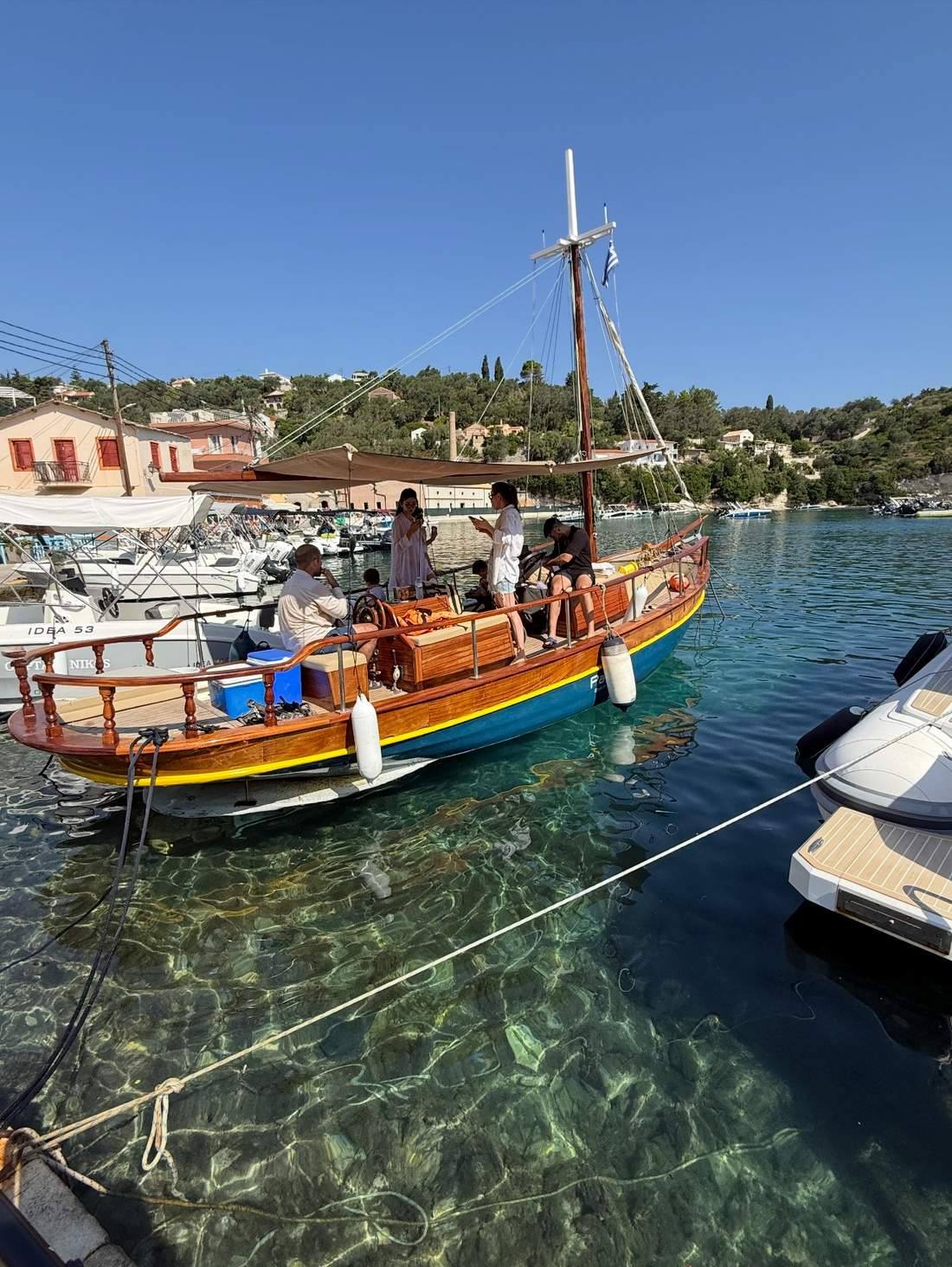 A traditional wooden boat moored in the Ionian