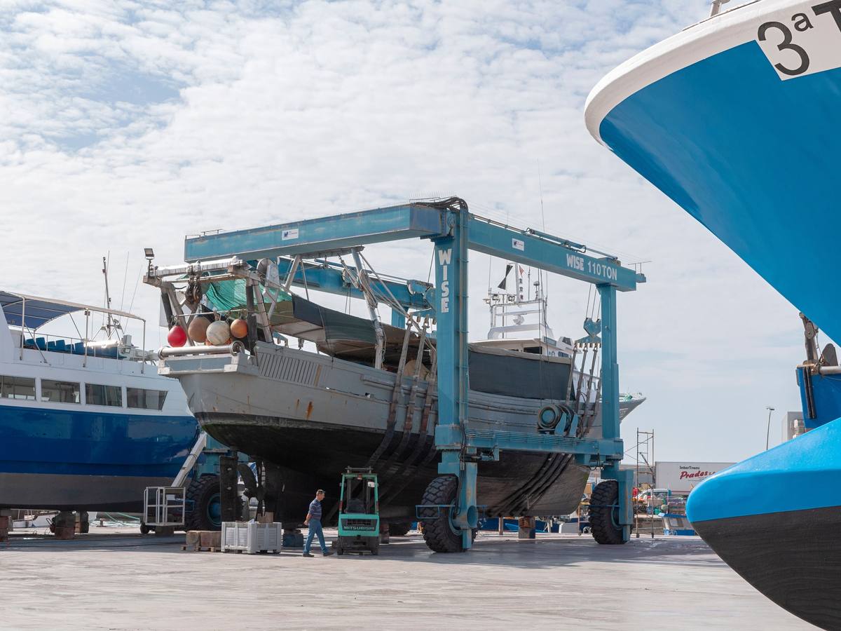 A yacht hauled out on a travel lift for winter storage